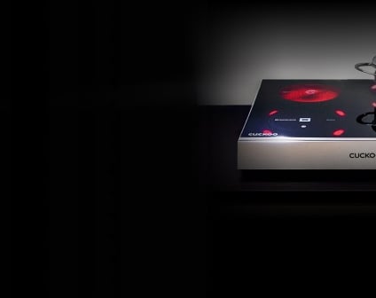 Cuckoo success story homepage banner featuring cuckoo's ai-powered induction cooktop.